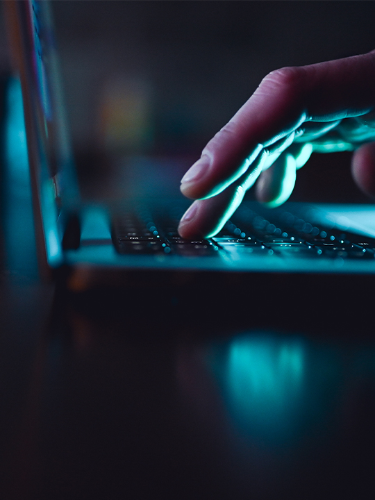 M Files Portrait 3 hands typing on keyboard in dark