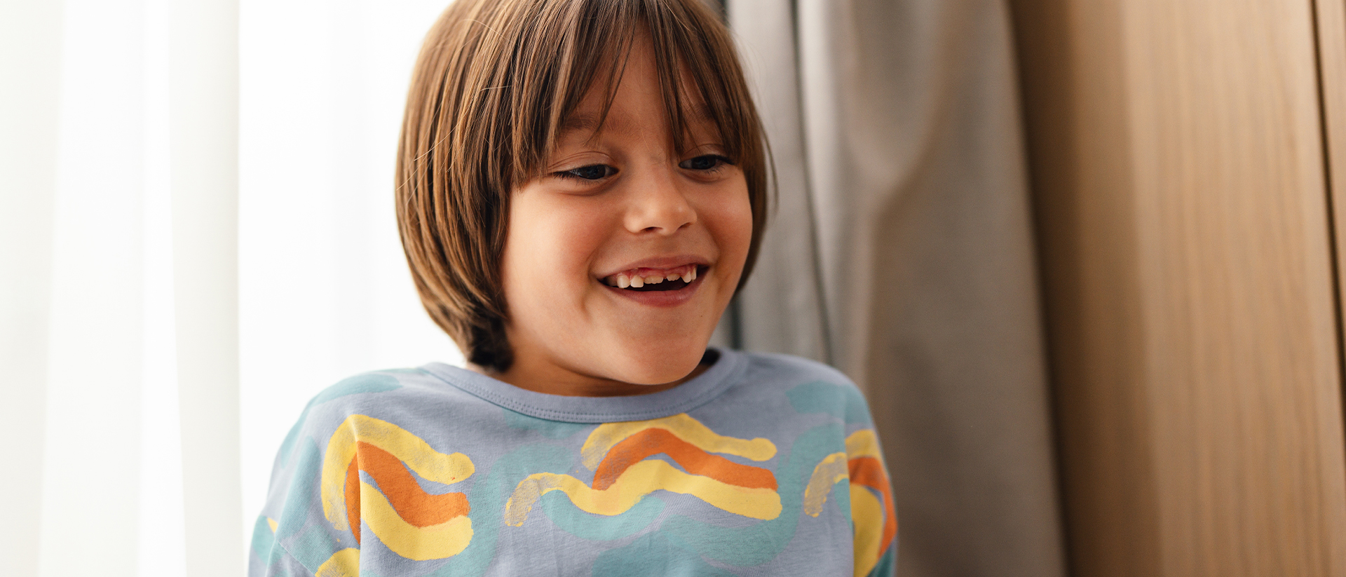 Spread a smile Header 5 boy smiling