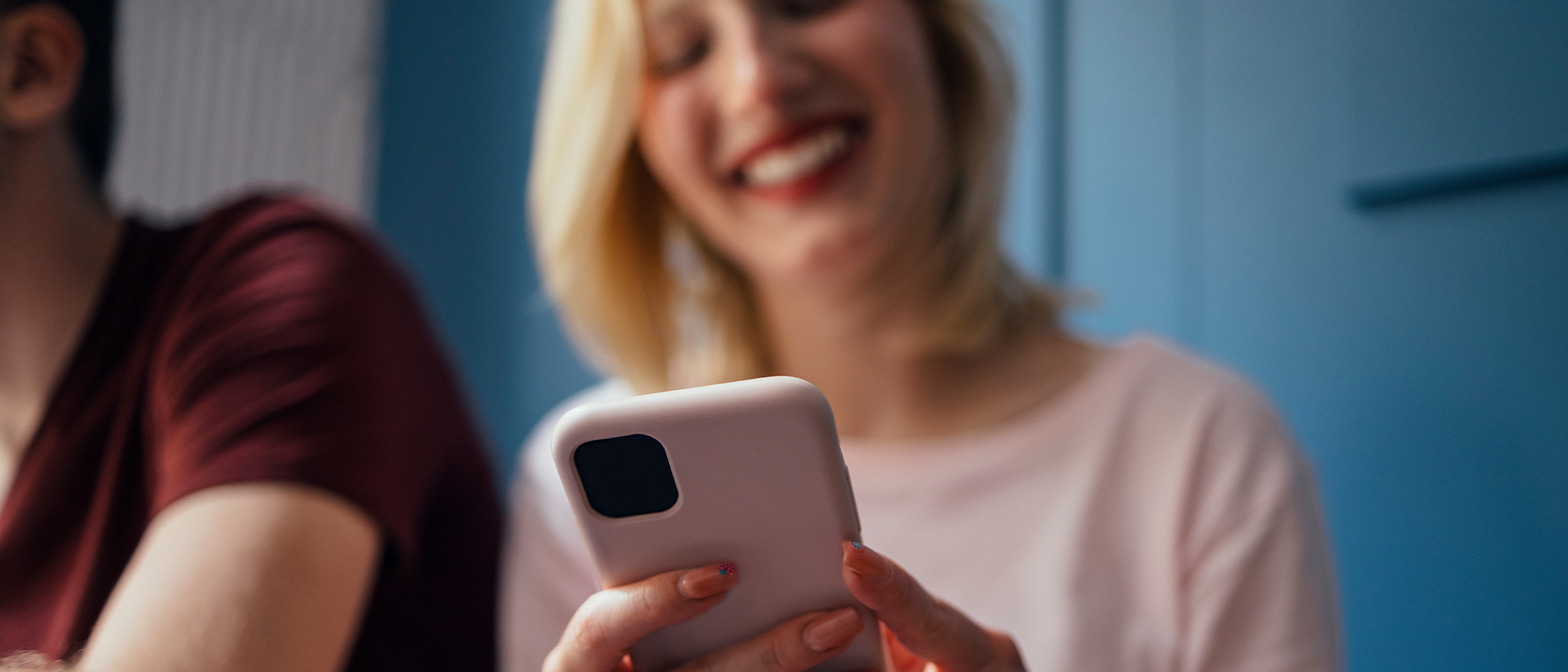 ePassi header image woman checking phone